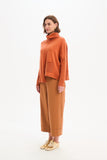 Tirelli - Roll Hem Pocket Knit - Amberstone